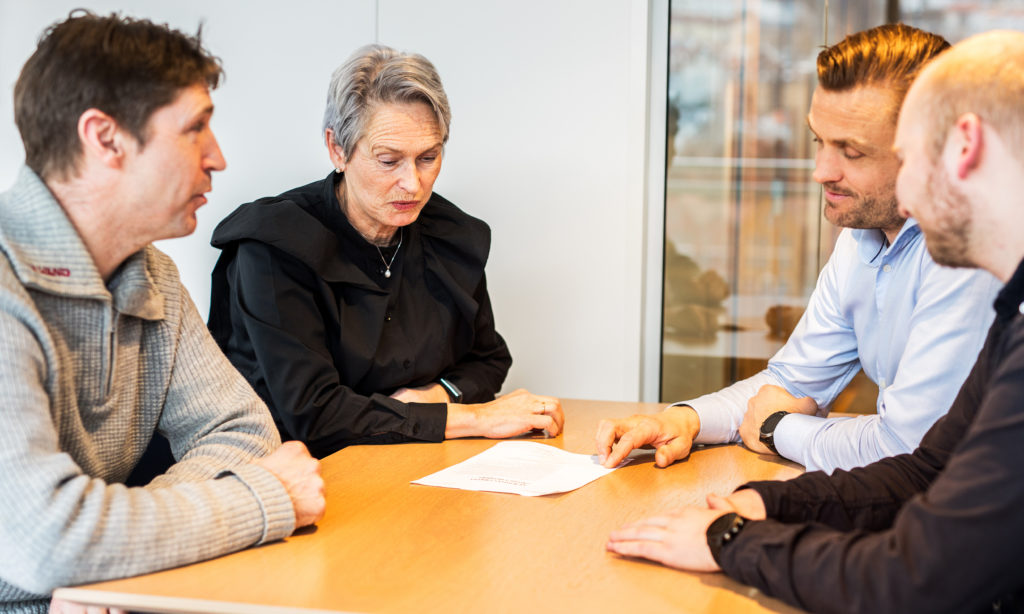 Four colleagues having a meeting in the office.