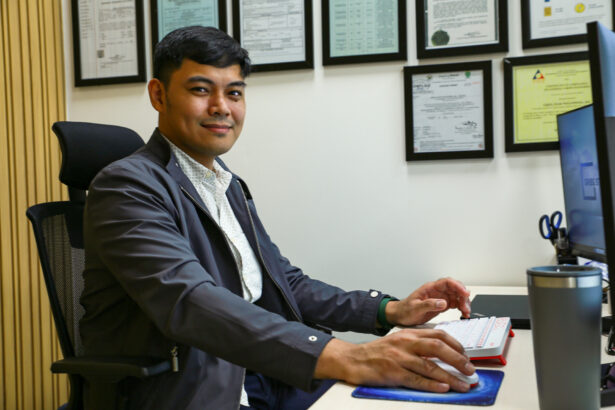Archie Maderang at his desk.